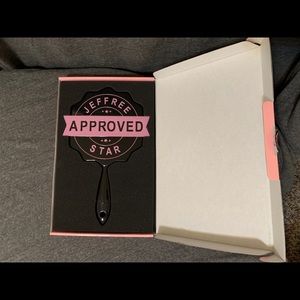 Jeffree Star Approved Stamp hand mirror.